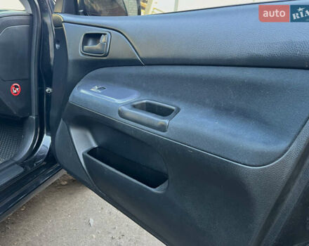 Черный Мицубиси Лансер, объемом двигателя 1.58 л и пробегом 156 тыс. км за 4599 $, фото 22 на Automoto.ua