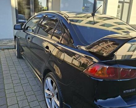 Мицубиси Лансер 2007 в Ужгороде на Automoto.ua Черный Мицубиси Лансер, объемом двигателя 2 л и пробегом 256 тыс. км за 7200 $, фото 6 на Automoto.ua