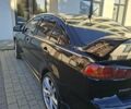 Мицубиси Лансер 2007 в Ужгороде на Automoto.ua Черный Мицубиси Лансер, объемом двигателя 2 л и пробегом 256 тыс. км за 7200 $, фото 6 на Automoto.ua