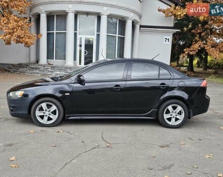 Міцубісі Lancer 2007 у Києві на Automoto.ua Чорний Міцубісі Lancer, об'ємом двигуна 2 л та пробігом 115 тис. км за 5000 $, фото 1 на Automoto.ua