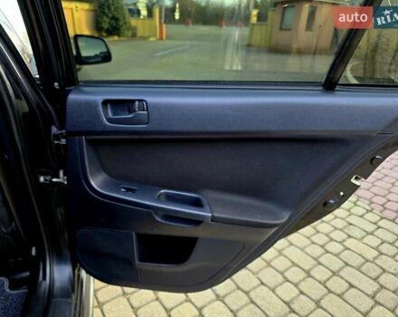 Чорний Міцубісі Lancer, об'ємом двигуна 2 л та пробігом 260 тис. км за 6555 $, фото 41 на Automoto.ua