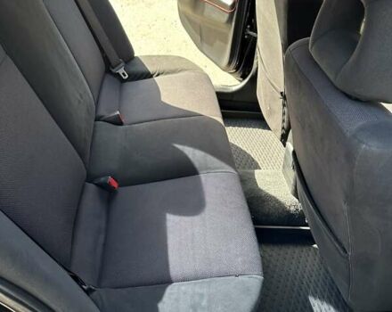 Черный Мицубиси Лансер, объемом двигателя 2 л и пробегом 272 тыс. км за 5514 $, фото 11 на Automoto.ua