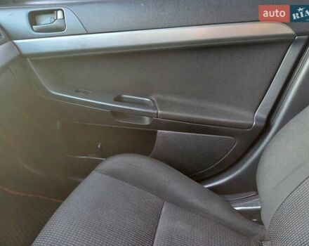 Чорний Міцубісі Lancer, об'ємом двигуна 1.5 л та пробігом 242 тис. км за 5550 $, фото 40 на Automoto.ua