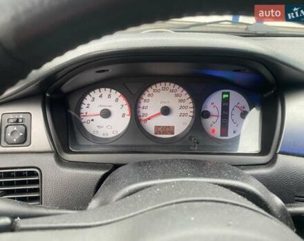 Черный Мицубиси Лансер, объемом двигателя 1.58 л и пробегом 263 тыс. км за 4000 $, фото 12 на Automoto.ua