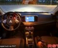 Мицубиси Лансер 2007 в Днепре (Днепропетровске) на Automoto.ua Черный Мицубиси Лансер, объемом двигателя 2 л и пробегом 230 тыс. км за 6800 $, фото 8 на Automoto.ua