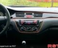 Чорний Міцубісі Lancer, об'ємом двигуна 1.6 л та пробігом 196 тис. км за 3900 $, фото 9 на Automoto.ua