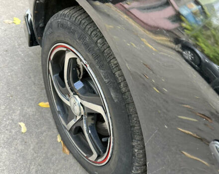 Чорний Міцубісі Lancer, об'ємом двигуна 1.58 л та пробігом 234 тис. км за 3800 $, фото 2 на Automoto.ua