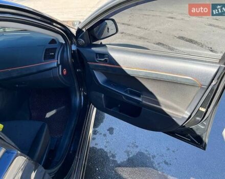 Чорний Міцубісі Lancer, об'ємом двигуна 2 л та пробігом 226 тис. км за 7200 $, фото 8 на Automoto.ua