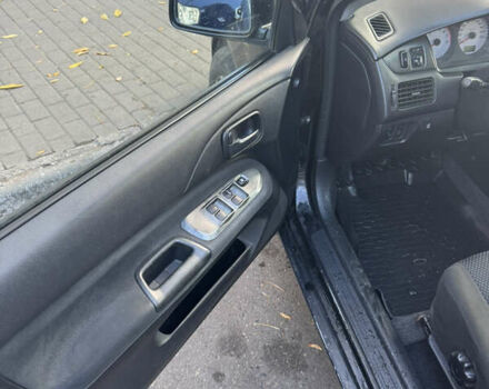 Чорний Міцубісі Lancer, об'ємом двигуна 1.58 л та пробігом 243 тис. км за 3800 $, фото 3 на Automoto.ua
