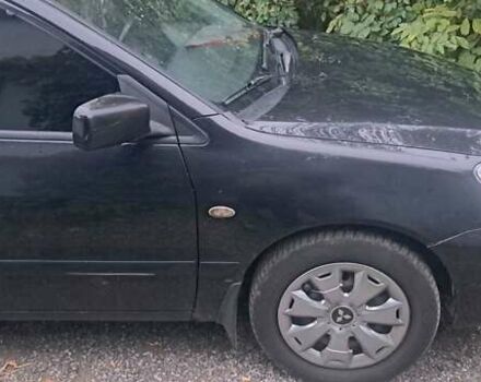 Чорний Міцубісі Lancer, об'ємом двигуна 1.6 л та пробігом 234 тис. км за 3900 $, фото 2 на Automoto.ua