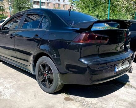 Чорний Міцубісі Lancer, об'ємом двигуна 2 л та пробігом 265 тис. км за 6300 $, фото 1 на Automoto.ua