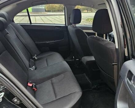 Міцубісі Lancer 2007 у Києві на Automoto.ua Чорний Міцубісі Lancer, об'ємом двигуна 2 л та пробігом 115 тис. км за 5000 $, фото 10 на Automoto.ua