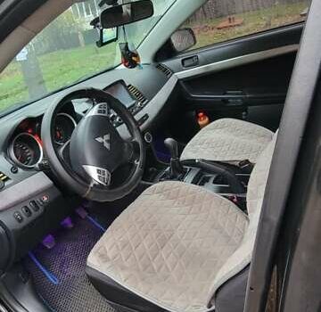 Черный Мицубиси Лансер, объемом двигателя 2 л и пробегом 260 тыс. км за 5500 $, фото 2 на Automoto.ua