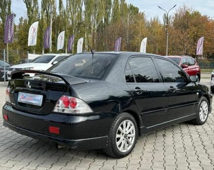 Мицубиси Лансер 2007 в Кривом Роге на Automoto.ua Черный Мицубиси Лансер, объемом двигателя 2 л и пробегом 143 тыс. км за 5400 $, фото 5 на Automoto.ua