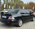 Мицубиси Лансер 2007 в Кривом Роге на Automoto.ua Черный Мицубиси Лансер, объемом двигателя 2 л и пробегом 143 тыс. км за 5400 $, фото 5 на Automoto.ua