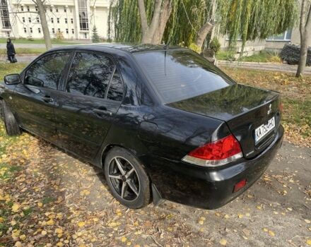 Міцубісі Lancer 2007 у Каневе на Automoto.ua Чорний Міцубісі Lancer, об'ємом двигуна 1.6 л та пробігом 310 тис. км за 4100 $, фото 3 на Automoto.ua
