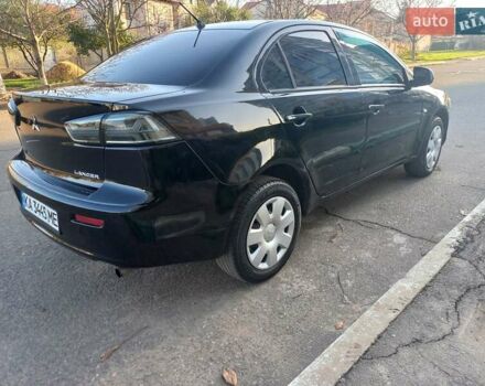 Чорний Міцубісі Lancer, об'ємом двигуна 1.5 л та пробігом 242 тис. км за 5550 $, фото 18 на Automoto.ua