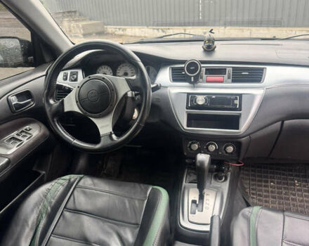 Чорний Міцубісі Lancer, об'ємом двигуна 2 л та пробігом 210 тис. км за 5500 $, фото 23 на Automoto.ua