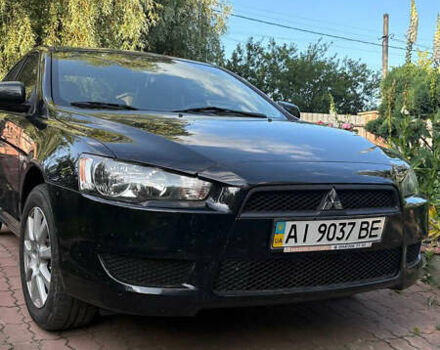 Черный Мицубиси Лансер, объемом двигателя 1.5 л и пробегом 111 тыс. км за 7500 $, фото 6 на Automoto.ua