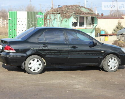 Чорний Міцубісі Lancer, об'ємом двигуна 1.6 л та пробігом 101 тис. км за 4699 $, фото 7 на Automoto.ua