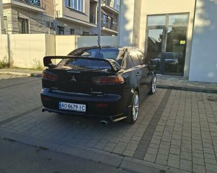 Мицубиси Лансер 2007 в Ужгороде на Automoto.ua Черный Мицубиси Лансер, объемом двигателя 2 л и пробегом 256 тыс. км за 7200 $, фото 8 на Automoto.ua