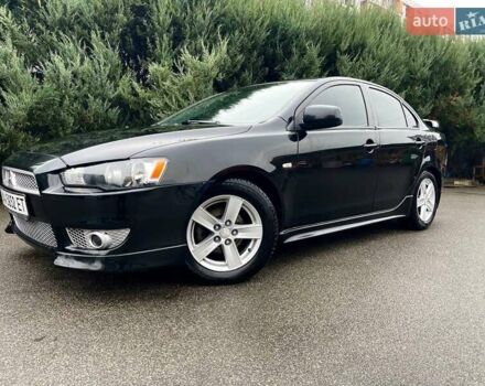 Чорний Міцубісі Lancer, об'ємом двигуна 2 л та пробігом 69 тис. км за 5700 $, фото 3 на Automoto.ua