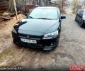 Черный Мицубиси Лансер, объемом двигателя 2 л и пробегом 250 тыс. км за 6500 $, фото 10 на Automoto.ua