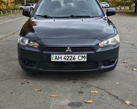 Міцубісі Lancer 2007 у Києві на Automoto.ua Чорний Міцубісі Lancer, об'ємом двигуна 2 л та пробігом 115 тис. км за 5000 $, фото 8 на Automoto.ua