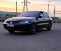 Черный Мицубиси Лансер, объемом двигателя 1.6 л и пробегом 215 тыс. км за 4000 $, фото 1 на Automoto.ua