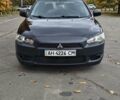 Міцубісі Lancer 2007 у Києві на Automoto.ua Чорний Міцубісі Lancer, об'ємом двигуна 2 л та пробігом 115 тис. км за 5000 $, фото 8 на Automoto.ua