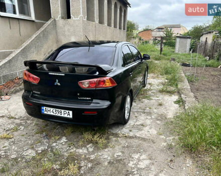 Чорний Міцубісі Lancer, об'ємом двигуна 2 л та пробігом 200 тис. км за 6900 $, фото 4 на Automoto.ua
