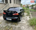 Чорний Міцубісі Lancer, об'ємом двигуна 2 л та пробігом 200 тис. км за 6900 $, фото 4 на Automoto.ua