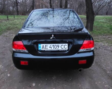 Чорний Міцубісі Lancer, об'ємом двигуна 1.6 л та пробігом 259 тис. км за 4500 $, фото 2 на Automoto.ua