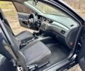 Чорний Міцубісі Lancer, об'ємом двигуна 1.6 л та пробігом 216 тис. км за 4990 $, фото 17 на Automoto.ua