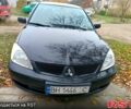 Чорний Міцубісі Lancer, об'ємом двигуна 1.6 л та пробігом 227 тис. км за 4100 $, фото 1 на Automoto.ua