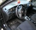 Чорний Міцубісі Lancer, об'ємом двигуна 1.6 л та пробігом 245 тис. км за 6100 $, фото 1 на Automoto.ua