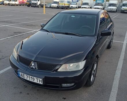Черный Мицубиси Лансер, объемом двигателя 1.6 л и пробегом 301 тыс. км за 4300 $, фото 9 на Automoto.ua