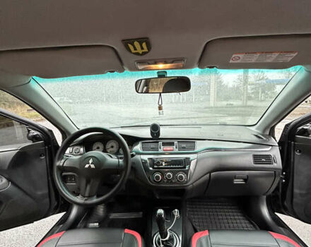 Черный Мицубиси Лансер, объемом двигателя 1.58 л и пробегом 254 тыс. км за 5000 $, фото 21 на Automoto.ua