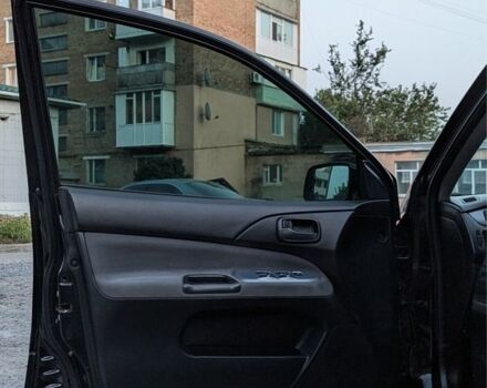 Черный Мицубиси Лансер, объемом двигателя 1.6 л и пробегом 226 тыс. км за 4800 $, фото 10 на Automoto.ua