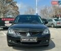 Чорний Міцубісі Lancer, об'ємом двигуна 1.6 л та пробігом 226 тис. км за 3899 $, фото 1 на Automoto.ua