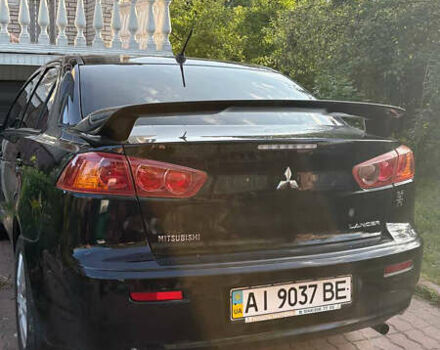 Черный Мицубиси Лансер, объемом двигателя 1.5 л и пробегом 111 тыс. км за 7500 $, фото 9 на Automoto.ua