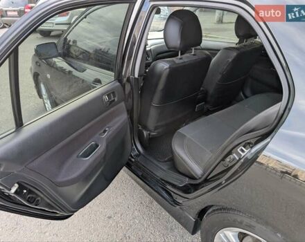 Чорний Міцубісі Lancer, об'ємом двигуна 2 л та пробігом 152 тис. км за 5500 $, фото 13 на Automoto.ua