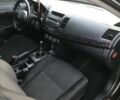 Чорний Міцубісі Lancer, об'ємом двигуна 2 л та пробігом 194 тис. км за 5950 $, фото 5 на Automoto.ua