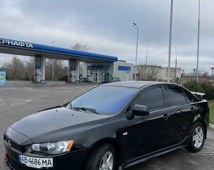 Черный Мицубиси Лансер, объемом двигателя 2 л и пробегом 350 тыс. км за 6700 $, фото 4 на Automoto.ua