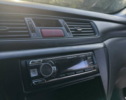 Чорний Міцубісі Lancer, об'ємом двигуна 2 л та пробігом 280 тис. км за 4600 $, фото 38 на Automoto.ua