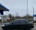 Черный Мицубиси Лансер, объемом двигателя 1.6 л и пробегом 263 тыс. км за 2900 $, фото 6 на Automoto.ua