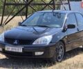 Черный Мицубиси Лансер, объемом двигателя 1.58 л и пробегом 219 тыс. км за 5800 $, фото 9 на Automoto.ua