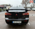Чорний Міцубісі Lancer, об'ємом двигуна 2 л та пробігом 281 тис. км за 6000 $, фото 9 на Automoto.ua
