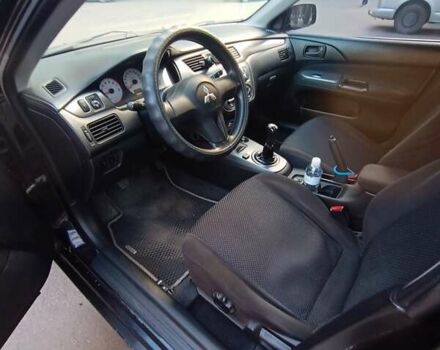 Чорний Міцубісі Lancer, об'ємом двигуна 1.6 л та пробігом 296 тис. км за 4500 $, фото 2 на Automoto.ua
