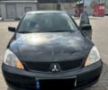 Чорний Міцубісі Lancer, об'ємом двигуна 1.6 л та пробігом 179 тис. км за 3800 $, фото 1 на Automoto.ua